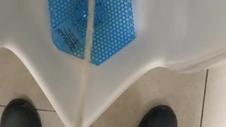 Pissing in a public urinal at work 1