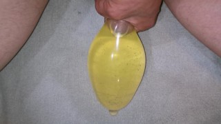 Filling condom with piss