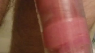 Puffy pumped penis completely fills 9" tube