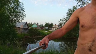 Naked Exhibitionist walks in the evening in the village