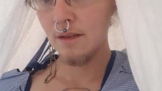 Trans nb in medical gown shows & plays with both nipples