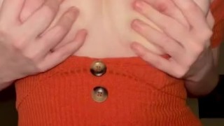 Masked while undressing orange dress