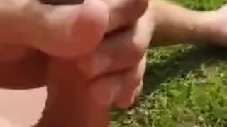 Nude sunbathing in backyard stroking my cock
