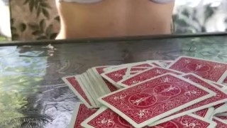 We were playing strip poker outside at our campsites gazebo, she lost so she had to show me her tits