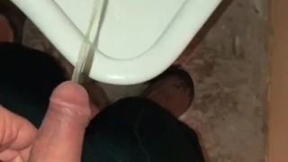 Girl Pissing into a Urinal & her Husband gets to Witness it first hand as he pisses right after her