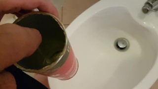 Boy pisses in the tube of pringles