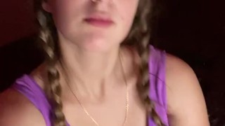 Giantess looks to tiny man before eating