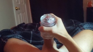 Twink plays with fleshlight