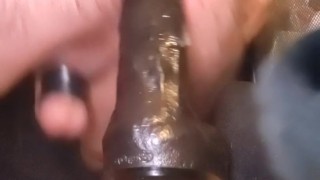 Riding huge dildo
