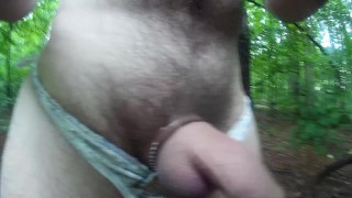 Uncut cock walking in the woods naked