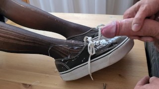 Cumming on her lovely Vans boots