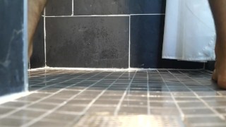 LAYING BEHIND ME WATCHING ME PEE ON THE FLOOR