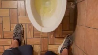 FedEx Guy takes a piss