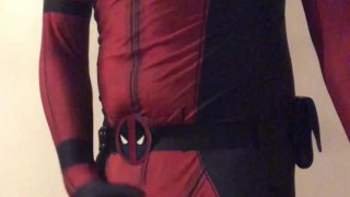 in DEADPOOL costume with NO UNDERWEAR ON and that BIG PACKAGE