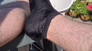 Hot feet cool down water pour wet foot and sock pull off
