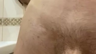 Guy jerking off in the bathroom