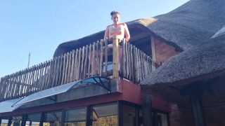 Bikini slut pissing from a balcony