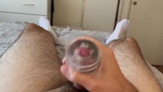 Hairy man moans and cums on his chest with his toys