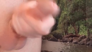 Masturbating in front of scenic setting