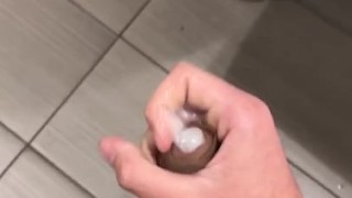 twink jerks off in public bathroom 
