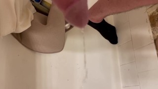 Jacking off while piss play pissing