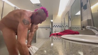 Caught completely naked while changing clothes in a mens restroom