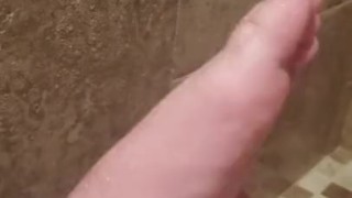 Playing with feet in the shower