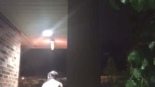 Showing Dick Outside the Hotel