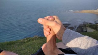 Huge Dirty Cock Gets Handjob In Public And Squirts A Lot Of Thick Sperm In Front Of The Beach