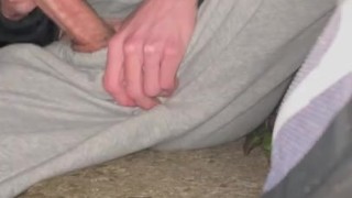 Scally lad gets horny smoking and strokes his dick outside 