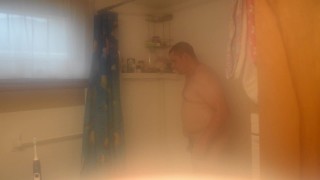 Getting cleaned up in the shower after getting very muddy and dirty