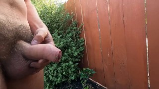 Buck naked uncut boy peeing where the neighbor can see.