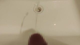 Peeing on the washbasin.