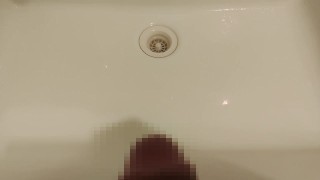Peeing on the washbasin.