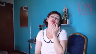 Red lipstick kissing teasing by Regina Noir.