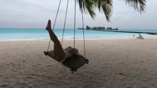 Hot Olesya Malibu swings on a swing in the Maldives