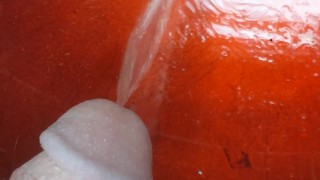 Uncut boy peeing in sink
