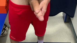 Horny guy in the locker room of the store jerks off a big dick.