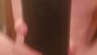 Twink plays with a 10 inch dildo after a shower