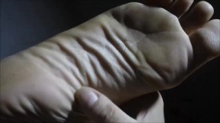 Rubbing hard leathery masculine soles 1