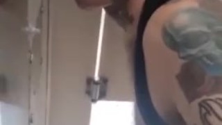 Sucking BBC at a gloryhole