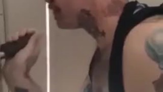 Sucking BBC at a gloryhole