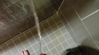 Stroking my cock and piss in the shower at work