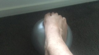 Super squishy gym ball under my big male feet tiny ball makes my feet feel enormous - MANLYFOOT