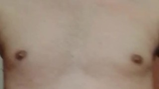 Nude boy changing his clothes.