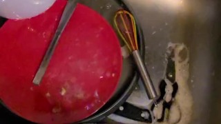 Desperate piss all over the dirty dishes before washing them
