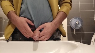 fast piss in sink in public toilet