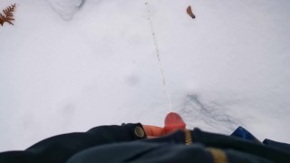 Boy pee in the snow