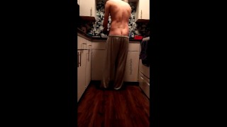 Pants slowly fall down while doing dishes