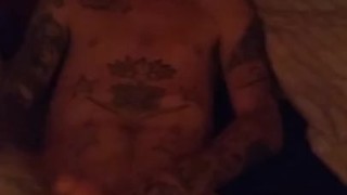 Hot Tattooed guy Jerks off himself teasing his MILF wife filming him. 